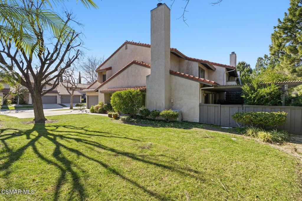 19137 Index Street, Unit 9 Porter Ranch, CA 91326 - Photo 4 of 39 a view of backyard with swimming pool and outdoor seating