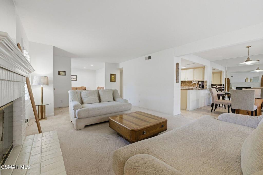 19137 Index Street, Unit 9 Porter Ranch, CA 91326 - Photo 10 of 39 a living room with furniture and a couch