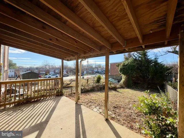 a view of a balcony with lake view and wooden floor