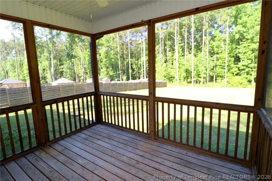 8424 Rhodes Road Apex, NC 27539 - Photo 30 of 31 a view of wooden balcony with outdoor space