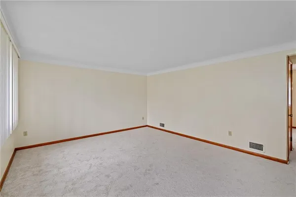 an empty room with an entryway