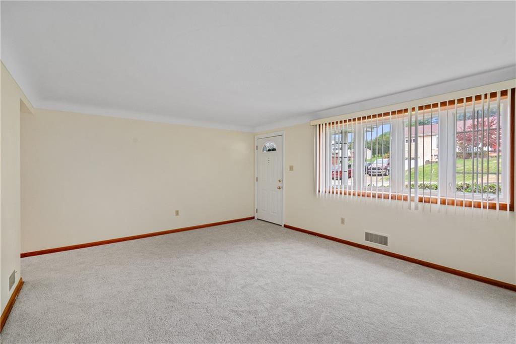 11490 McKee Road Irwin, PA 15642 - Photo 14 of 28 an empty room with windows