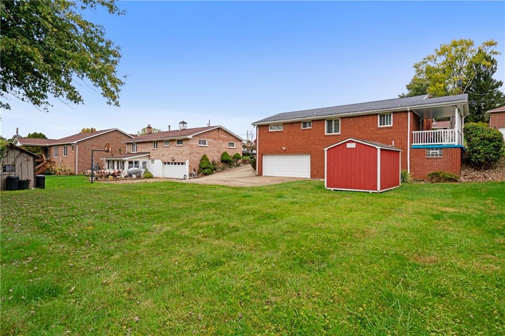 11490 McKee Road Irwin, PA 15642 - Photo 24 of 28 a view of a front of a house with a yard
