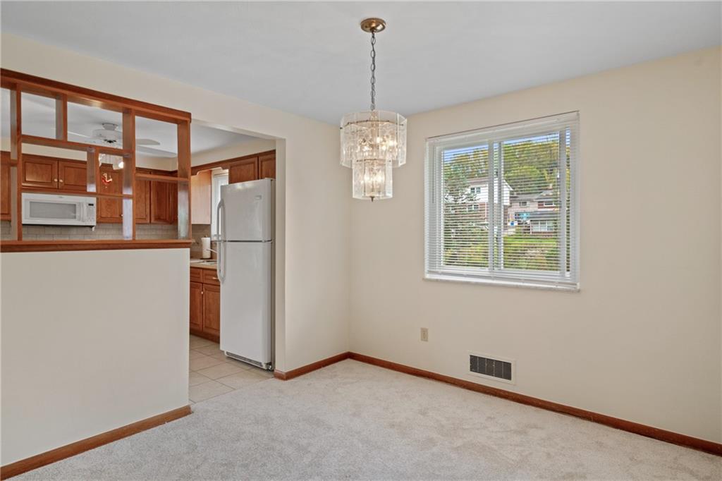 11490 McKee Road Irwin, PA 15642 - Photo 10 of 28 a view of an empty room with a window
