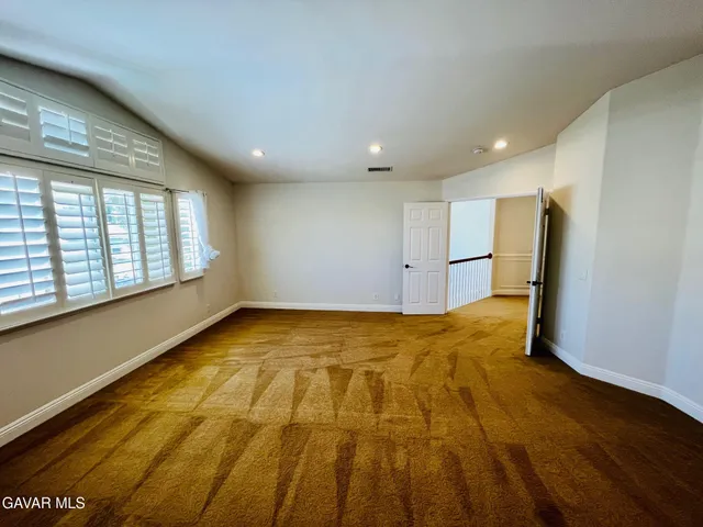 a view of an empty room and window