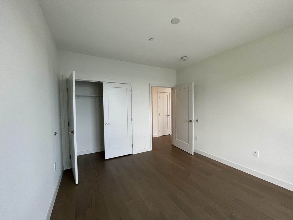 45 Lewis Street, Unit 310 Boston, MA 02128 - Photo 8 of 11 a view of an empty room
