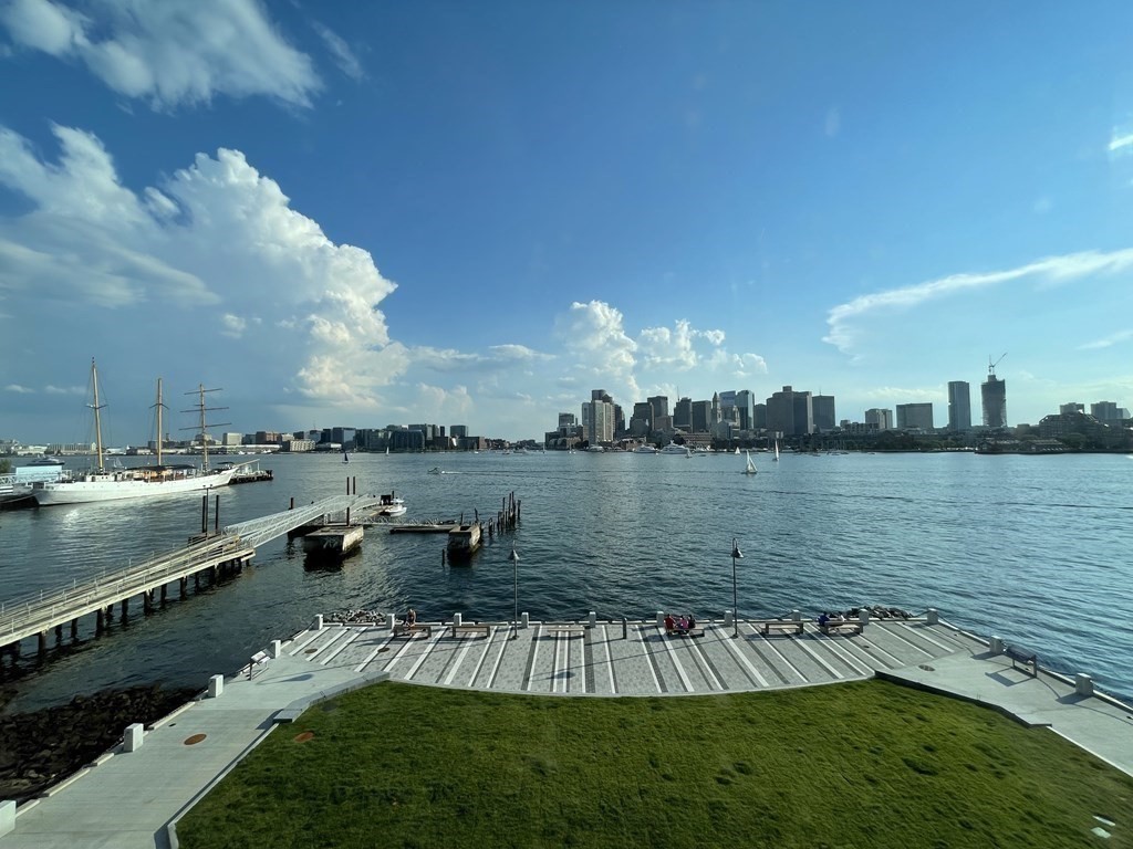 45 Lewis Street, Unit 310 Boston, MA 02128 - Photo 10 of 11 a view of a lake with houses in front of it