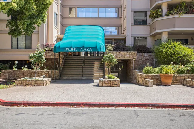 a front view of building with outdoor space