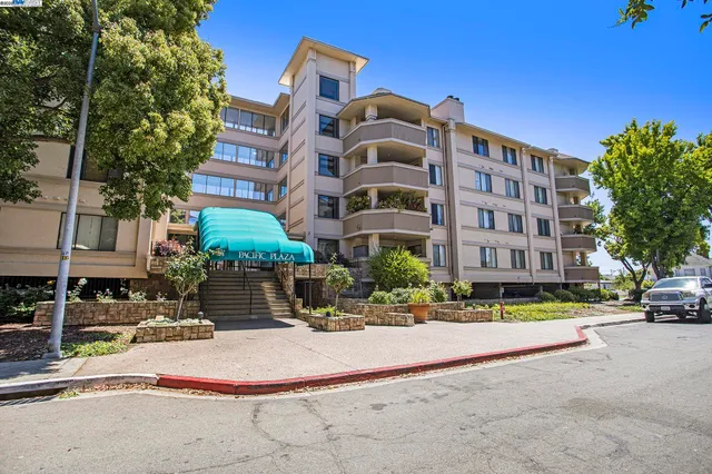 a front view of a building with street view