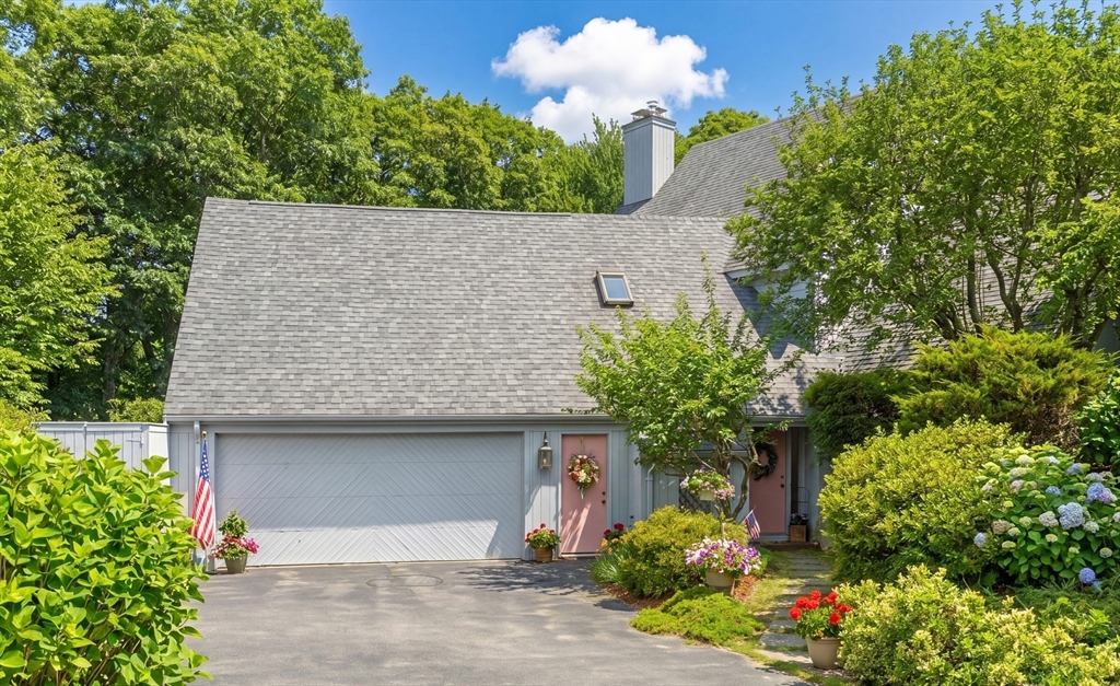 94 Howland Road Westport, MA 02790 - Photo 3 of 33 a front view of a house with a yard