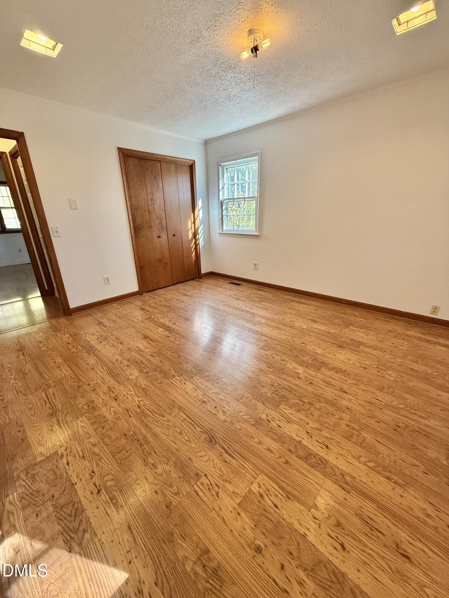 2320 Poindexter Road Hurdle Mills, NC 27541 - Photo 20 of 57 a view of an empty room with a window