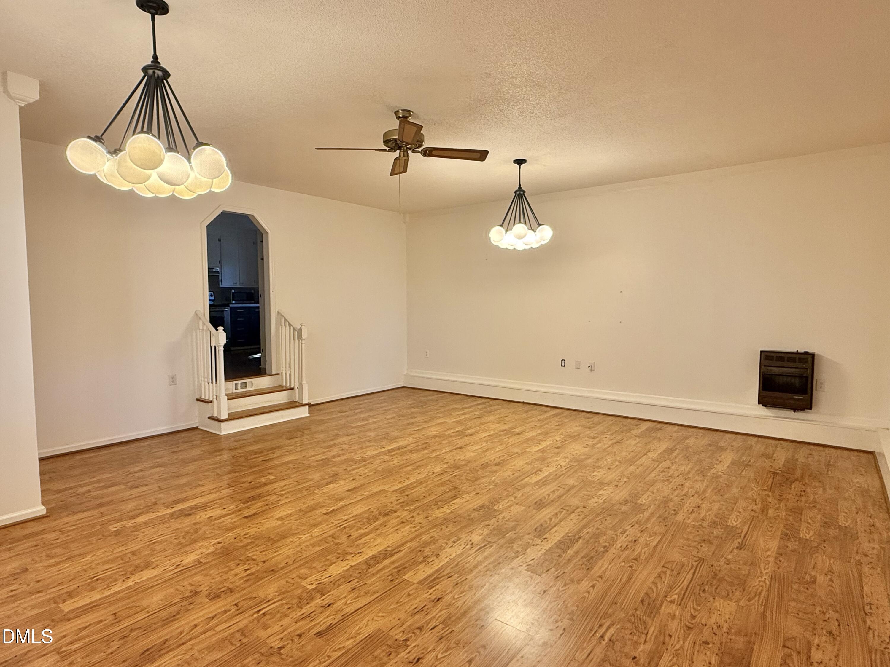 2320 Poindexter Road Hurdle Mills, NC 27541 - Photo 2 of 57 a view of a room with window and chandelier