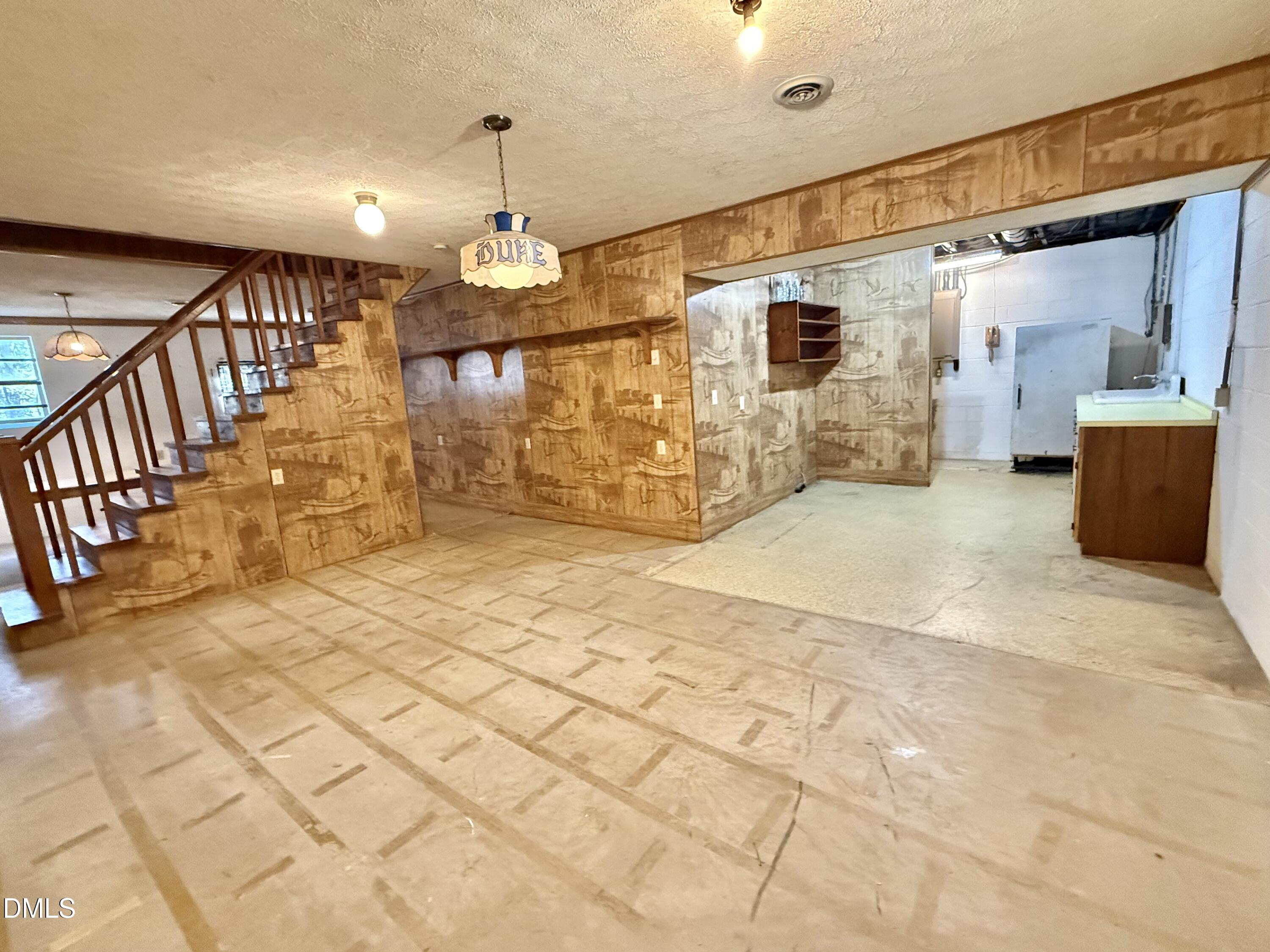 2320 Poindexter Road Hurdle Mills, NC 27541 - Photo 34 of 57 a view of a hallway with wooden floor