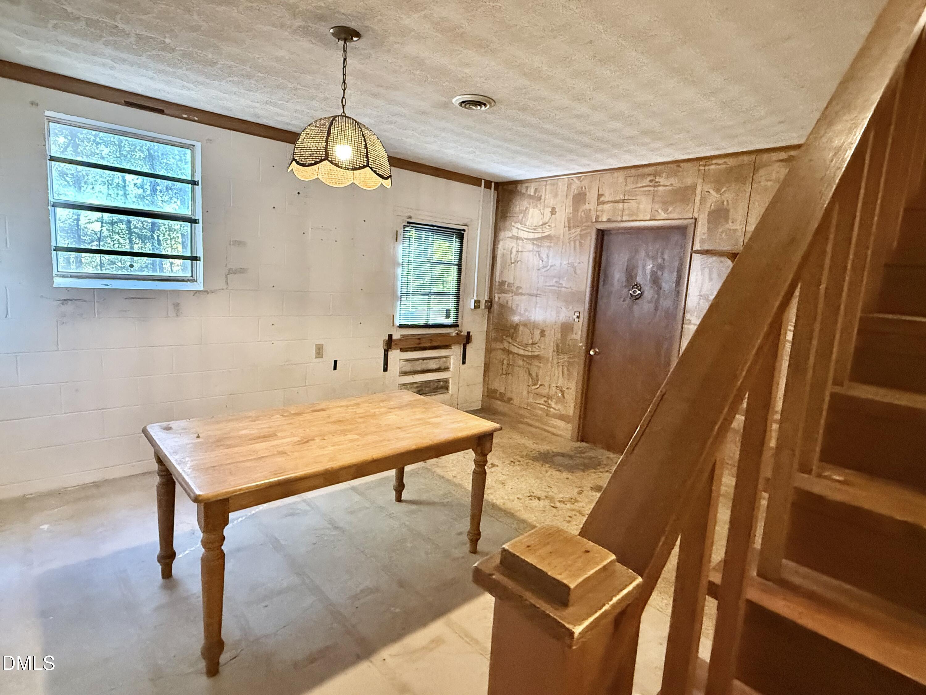 2320 Poindexter Road Hurdle Mills, NC 27541 - Photo 37 of 57 a dining room with furniture and window