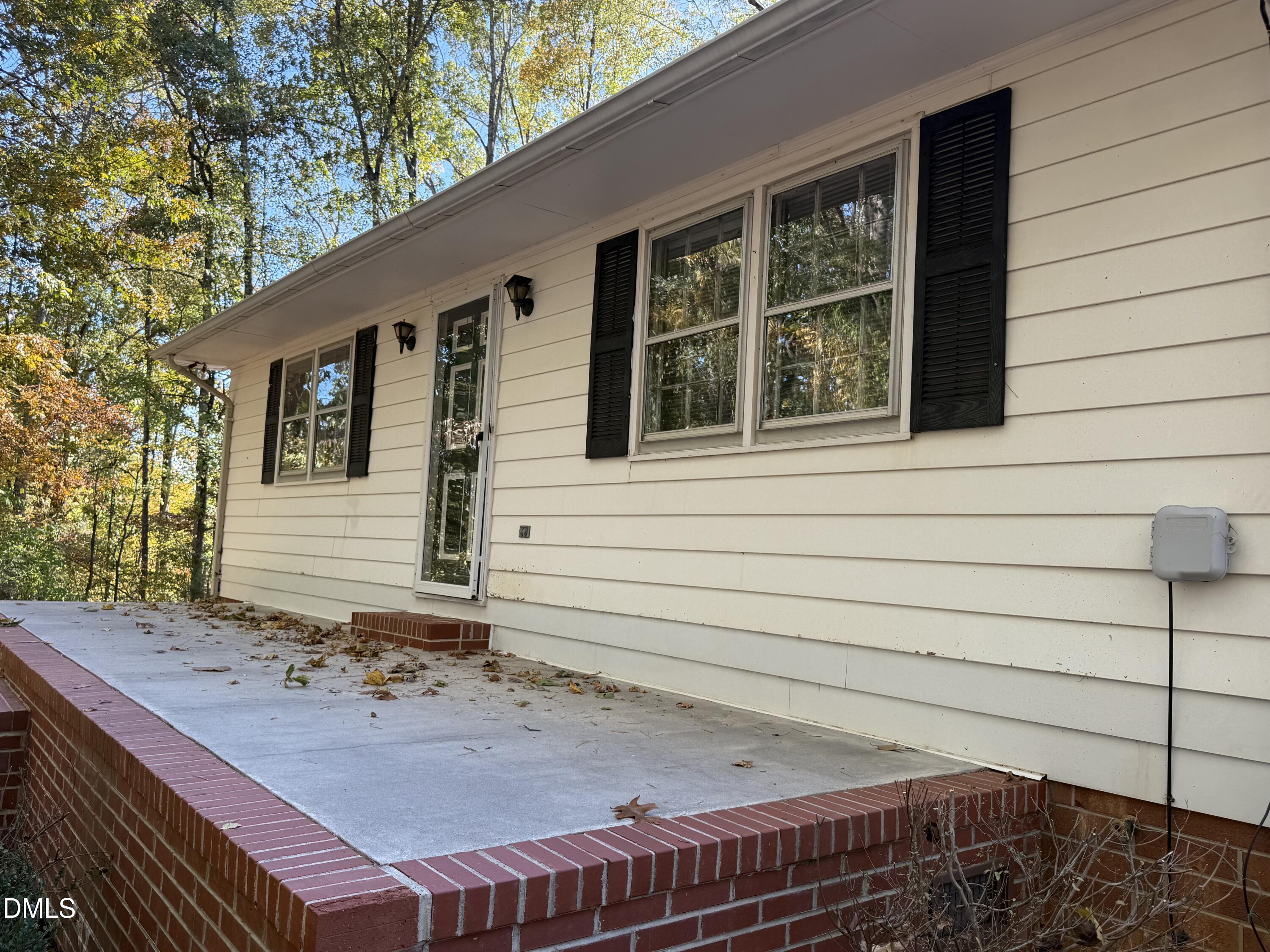 2320 Poindexter Road Hurdle Mills, NC 27541 - Photo 56 of 57 a view of house with backyard