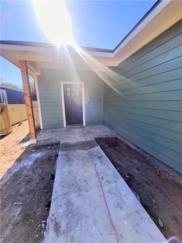 a view of a hallway with a couch