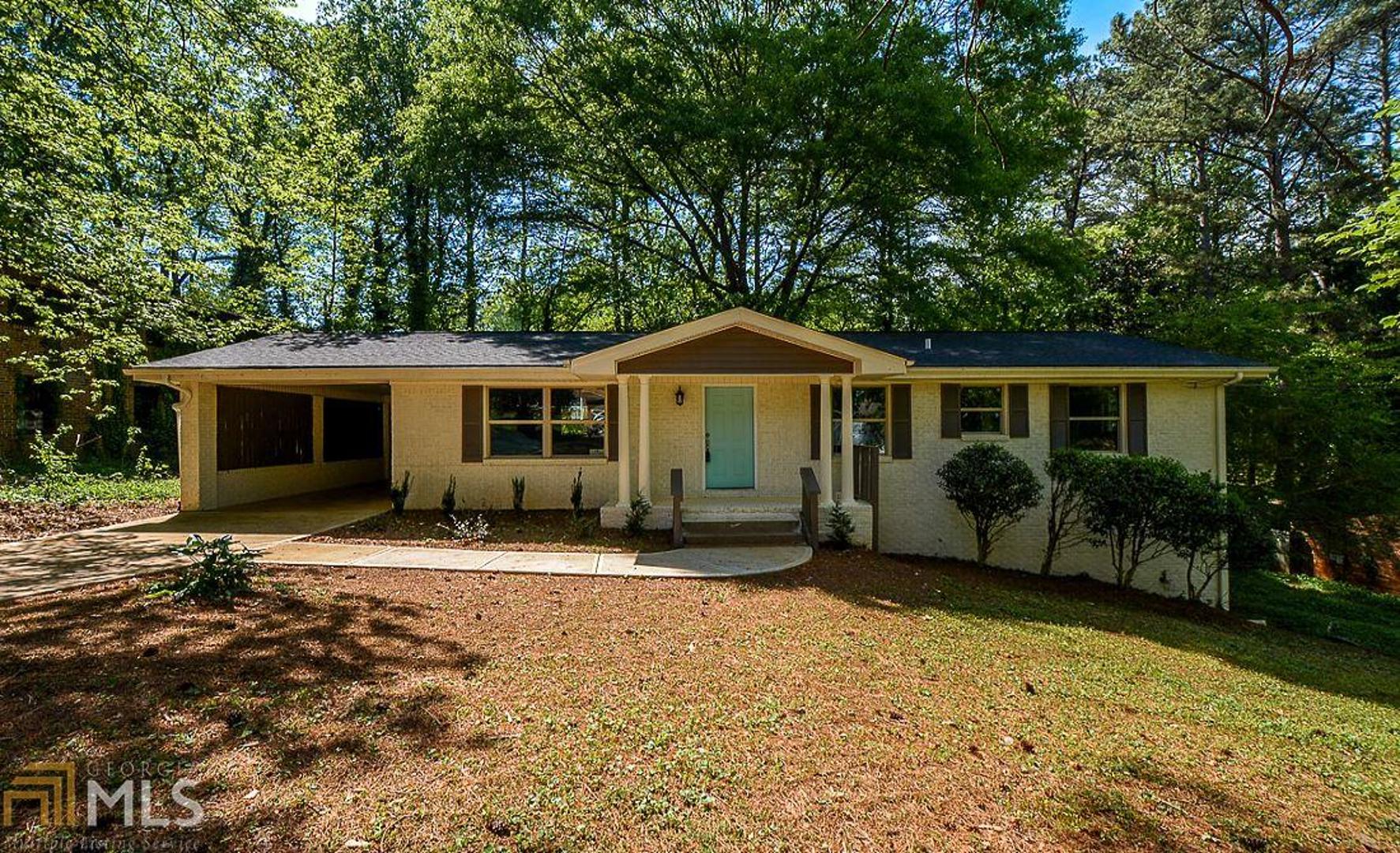 2695 Terratim Lane, Unit 20 Decatur, GA 30034 - Photo 1 of 1 a front view of house with yard and porch