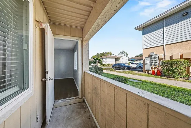 a view of a balcony with city view