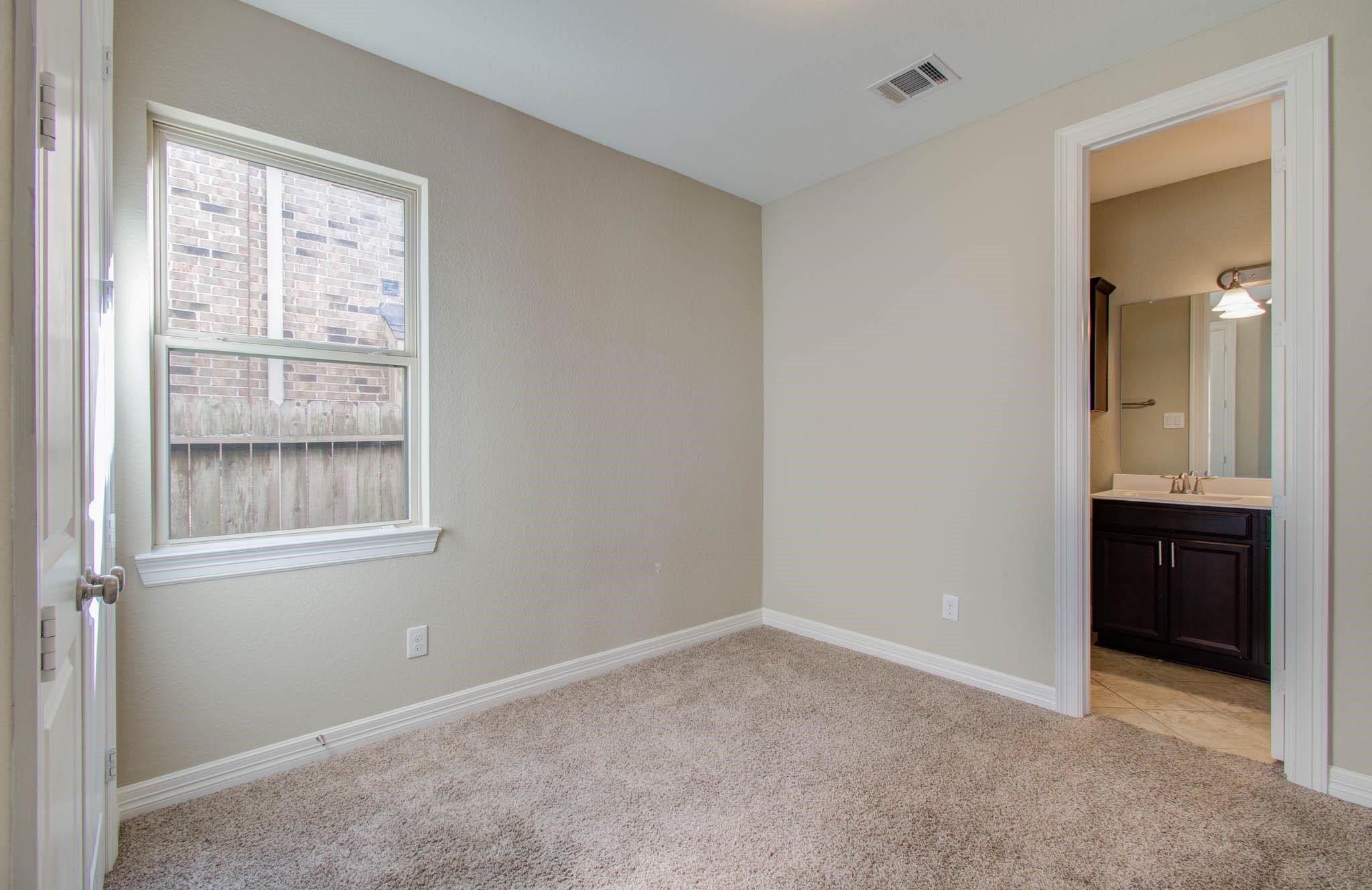 27911 Seger Bnd Trail Spring, TX 77386 - Photo 17 of 49 a view of an empty room with a window