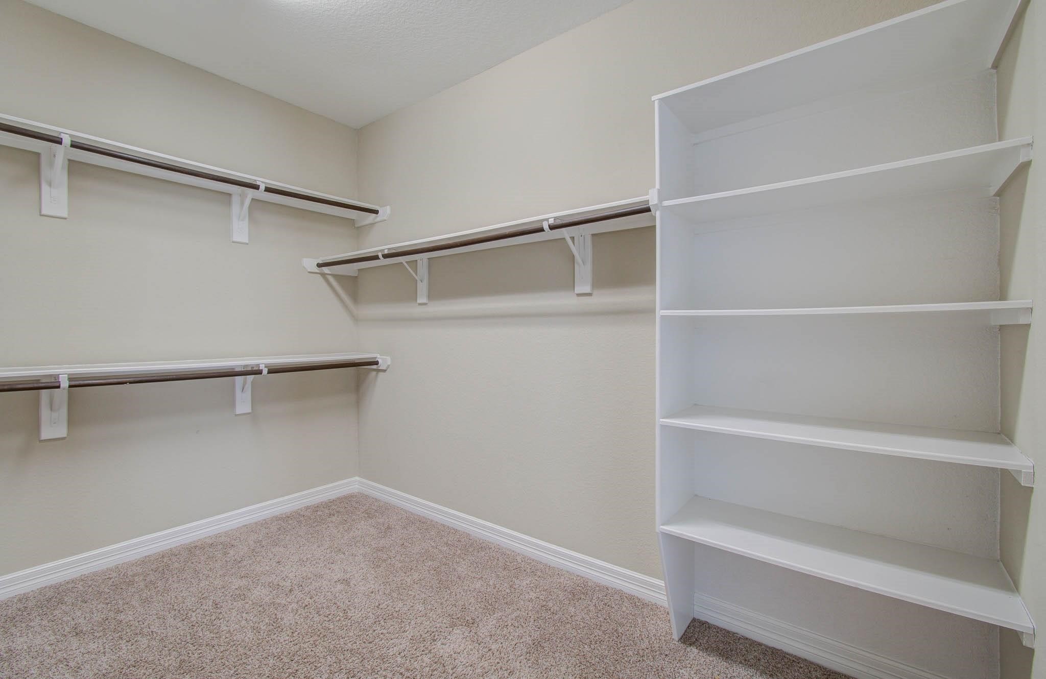 27911 Seger Bnd Trail Spring, TX 77386 - Photo 33 of 49 a view of an empty walk in closet