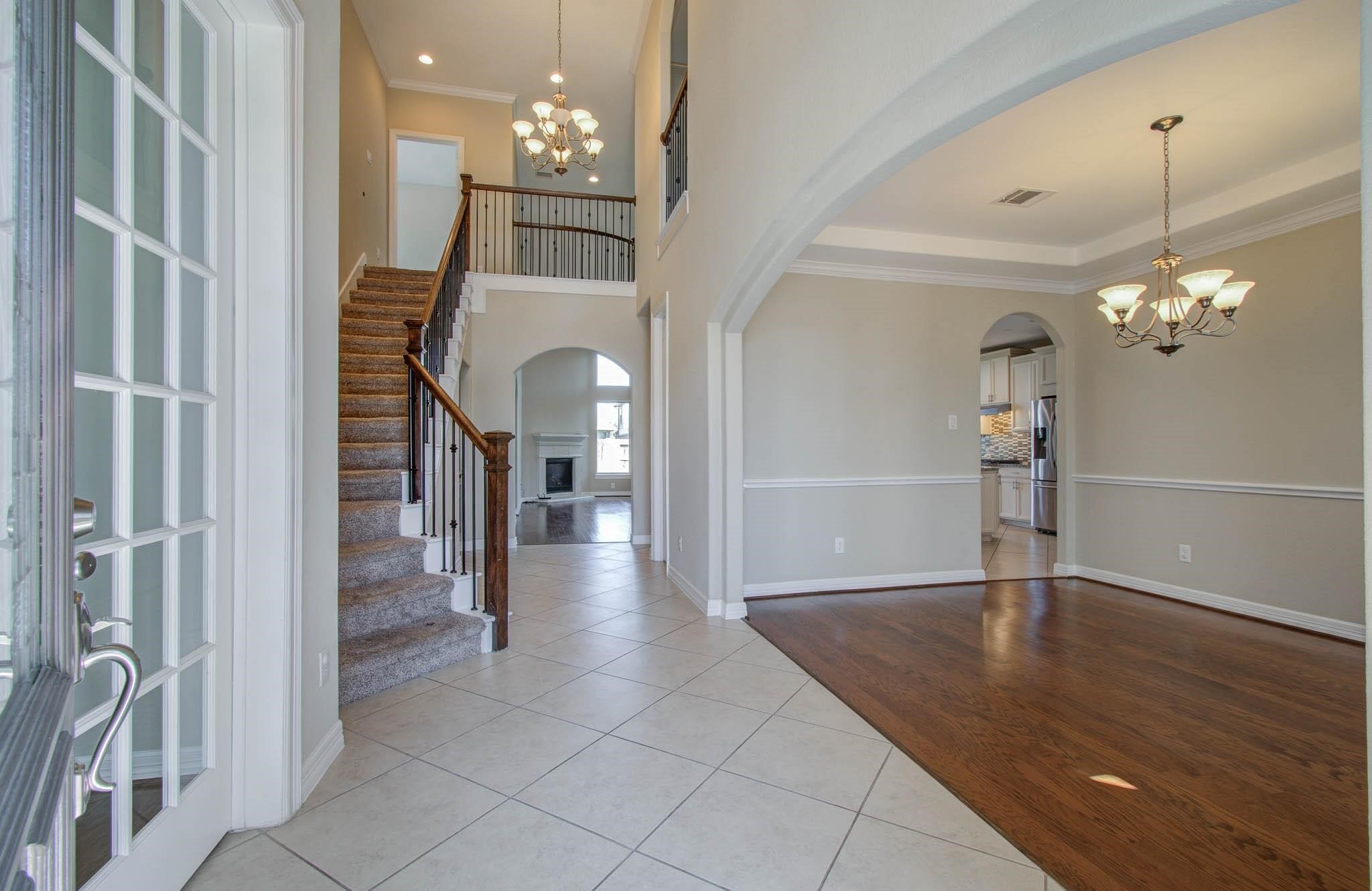 27911 Seger Bnd Trail Spring, TX 77386 - Photo 4 of 49 a view of a chandelier in a room with a chandelier