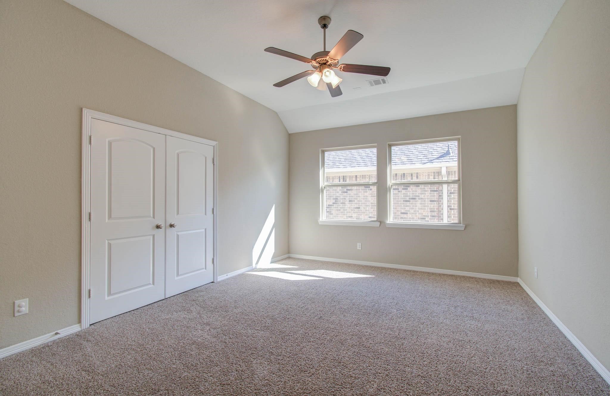 27911 Seger Bnd Trail Spring, TX 77386 - Photo 45 of 49 a view of a livingroom with a ceiling fan and window