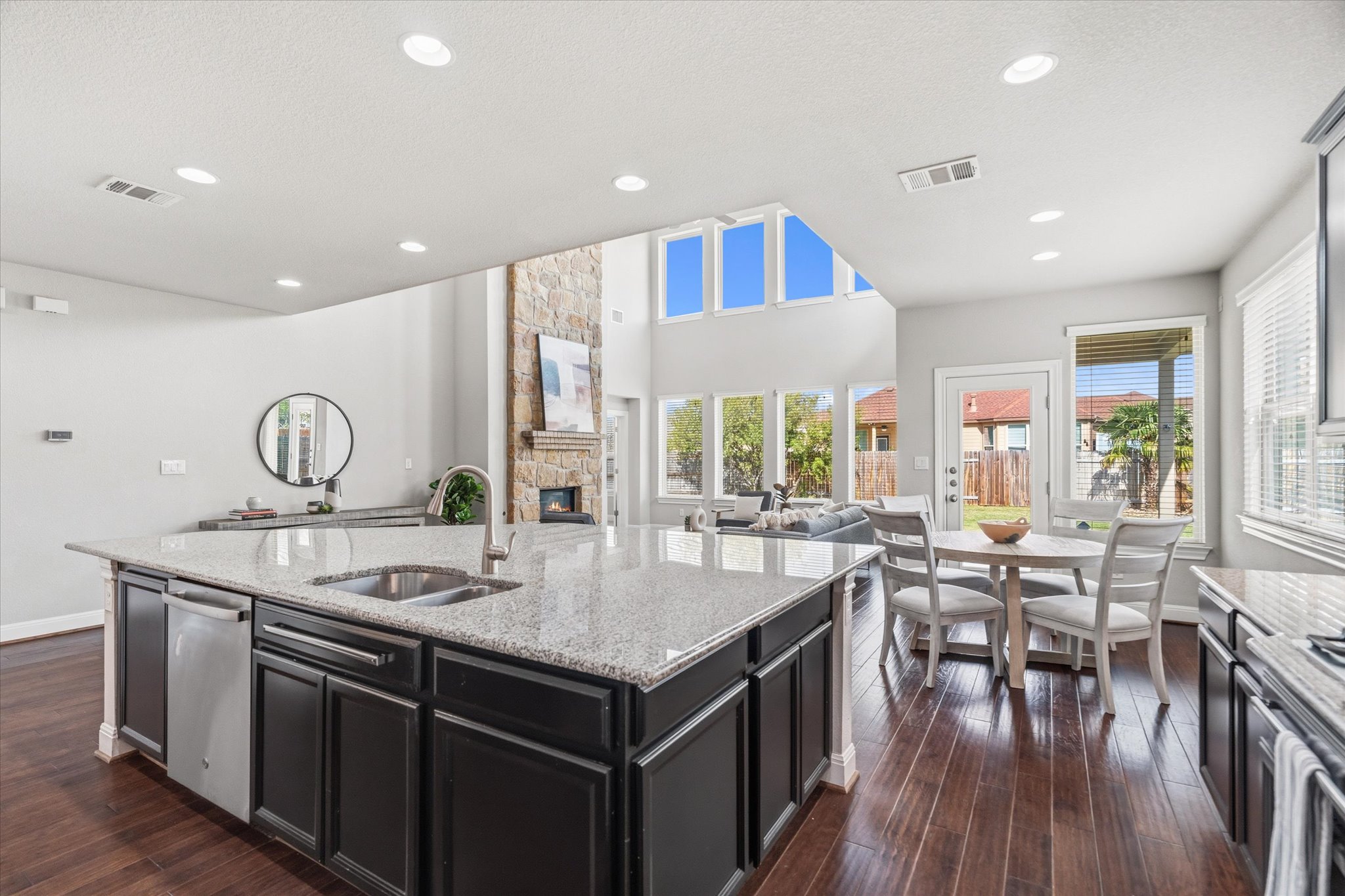 2300 Centennial Loop Round Rock, TX 78665 - Photo 12 of 40 The open kitchen layout connects seamlessly to the living and dining areas.