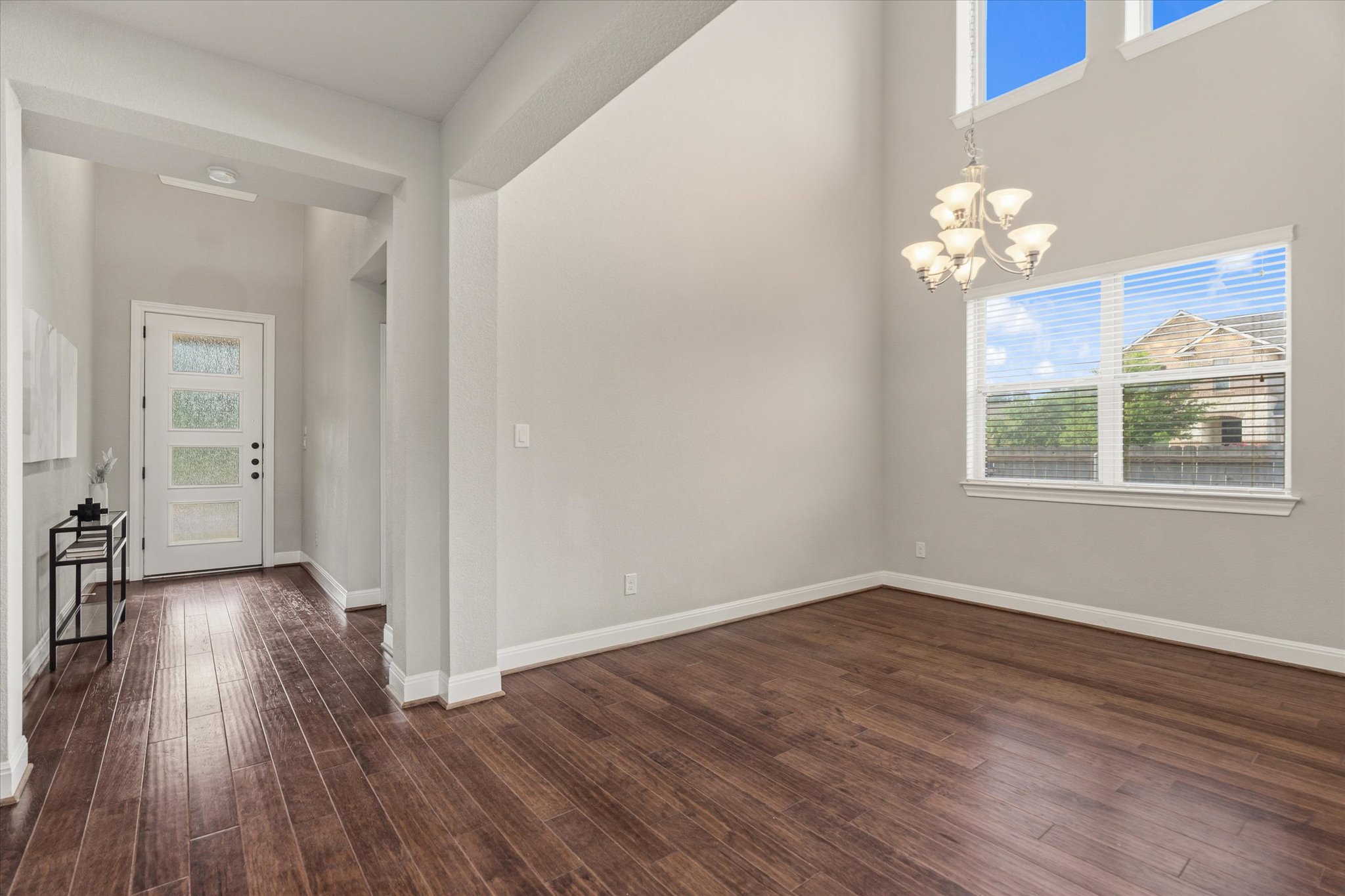 2300 Centennial Loop Round Rock, TX 78665 - Photo 14 of 40 The formal dining room offers an elegant space for hosting holiday dinners and gatherings.