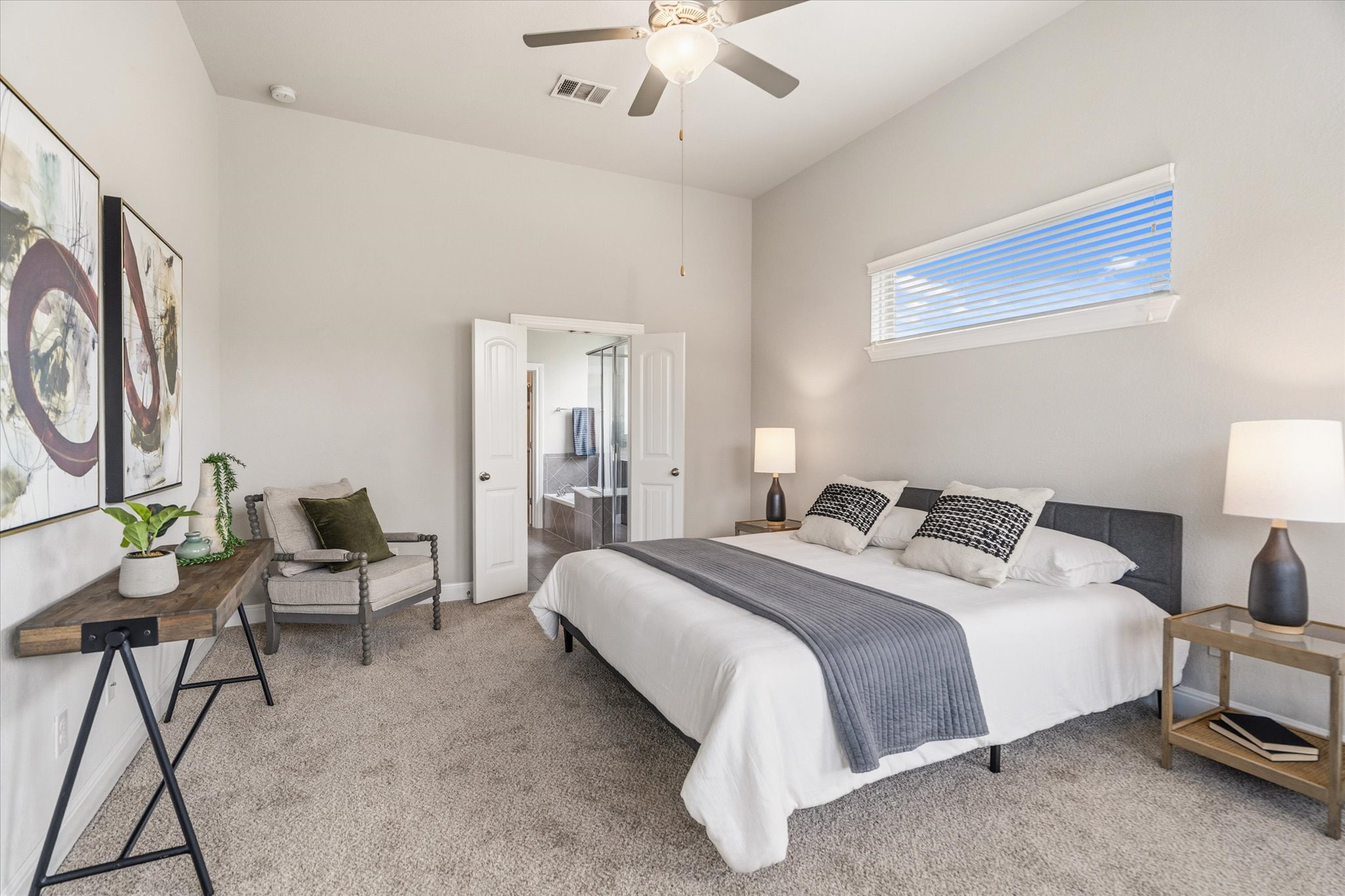 2300 Centennial Loop Round Rock, TX 78665 - Photo 18 of 40 The spacious primary suite offers a peaceful retreat at the end of the day.