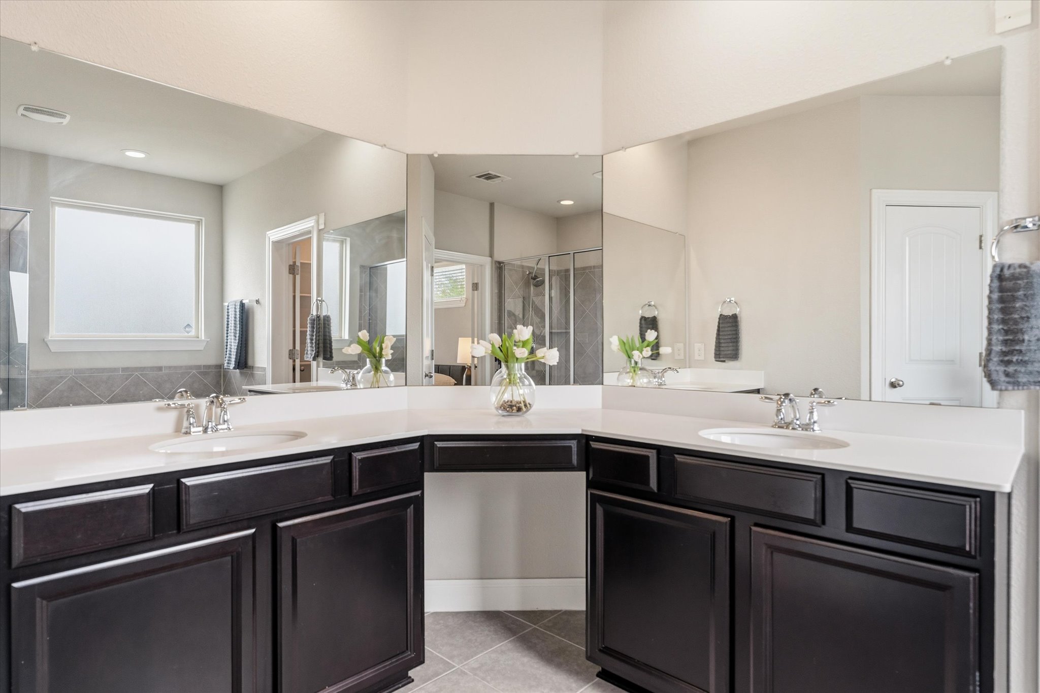 2300 Centennial Loop Round Rock, TX 78665 - Photo 20 of 40 The primary bathroom features a large vanity with dual sinks for added convenience.