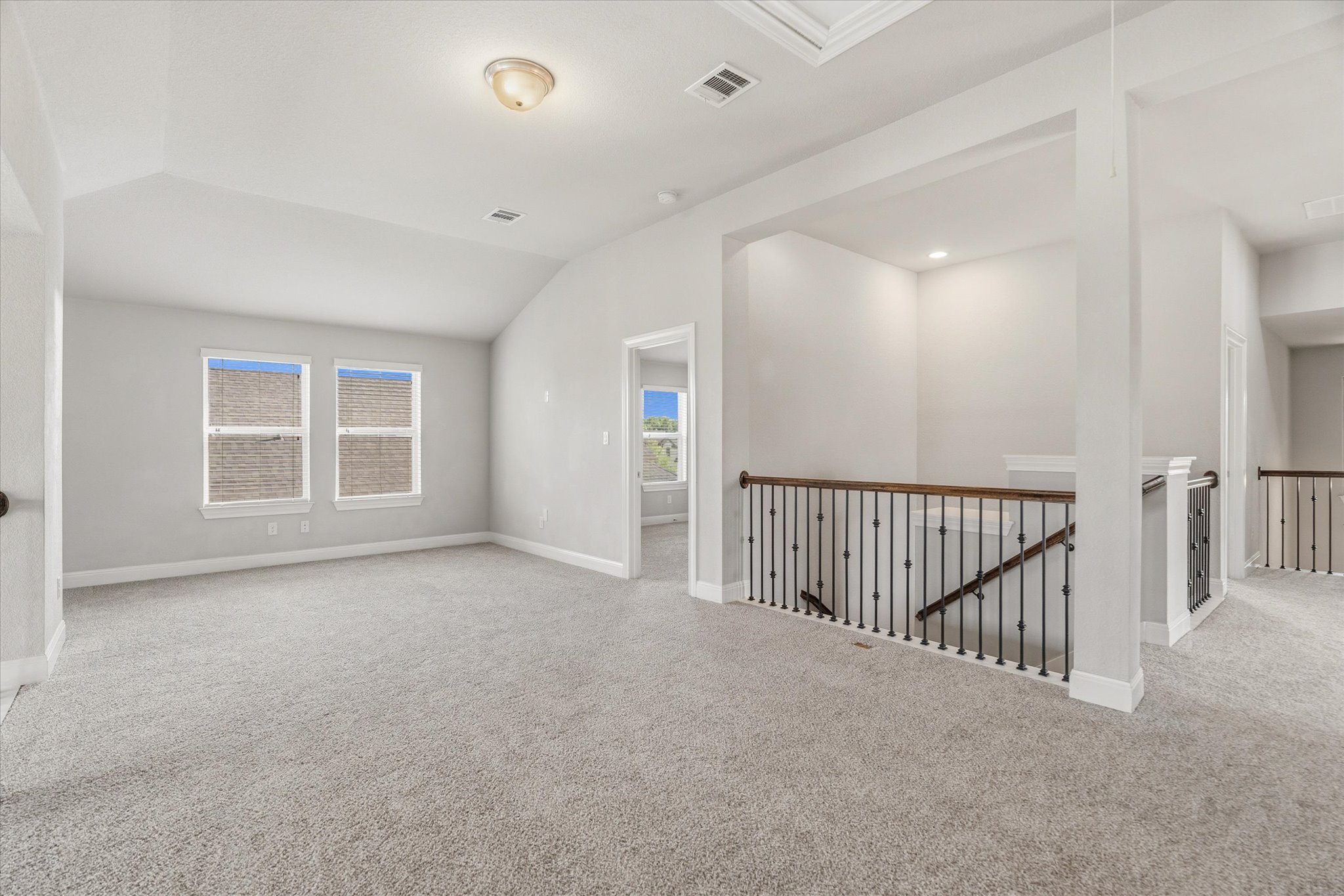 2300 Centennial Loop Round Rock, TX 78665 - Photo 23 of 40 The spacious game room provides a versatile upstairs retreat perfect for entertaining or relaxing.