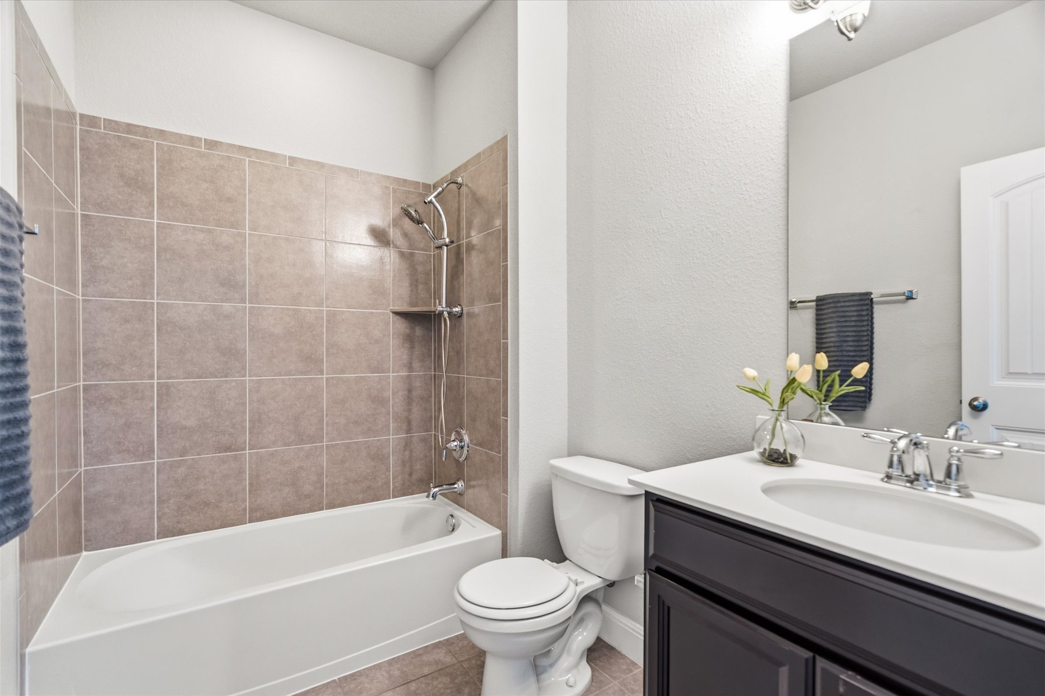 2300 Centennial Loop Round Rock, TX 78665 - Photo 28 of 40 Thoughtfully designed vanities offer ample counter space and storage.