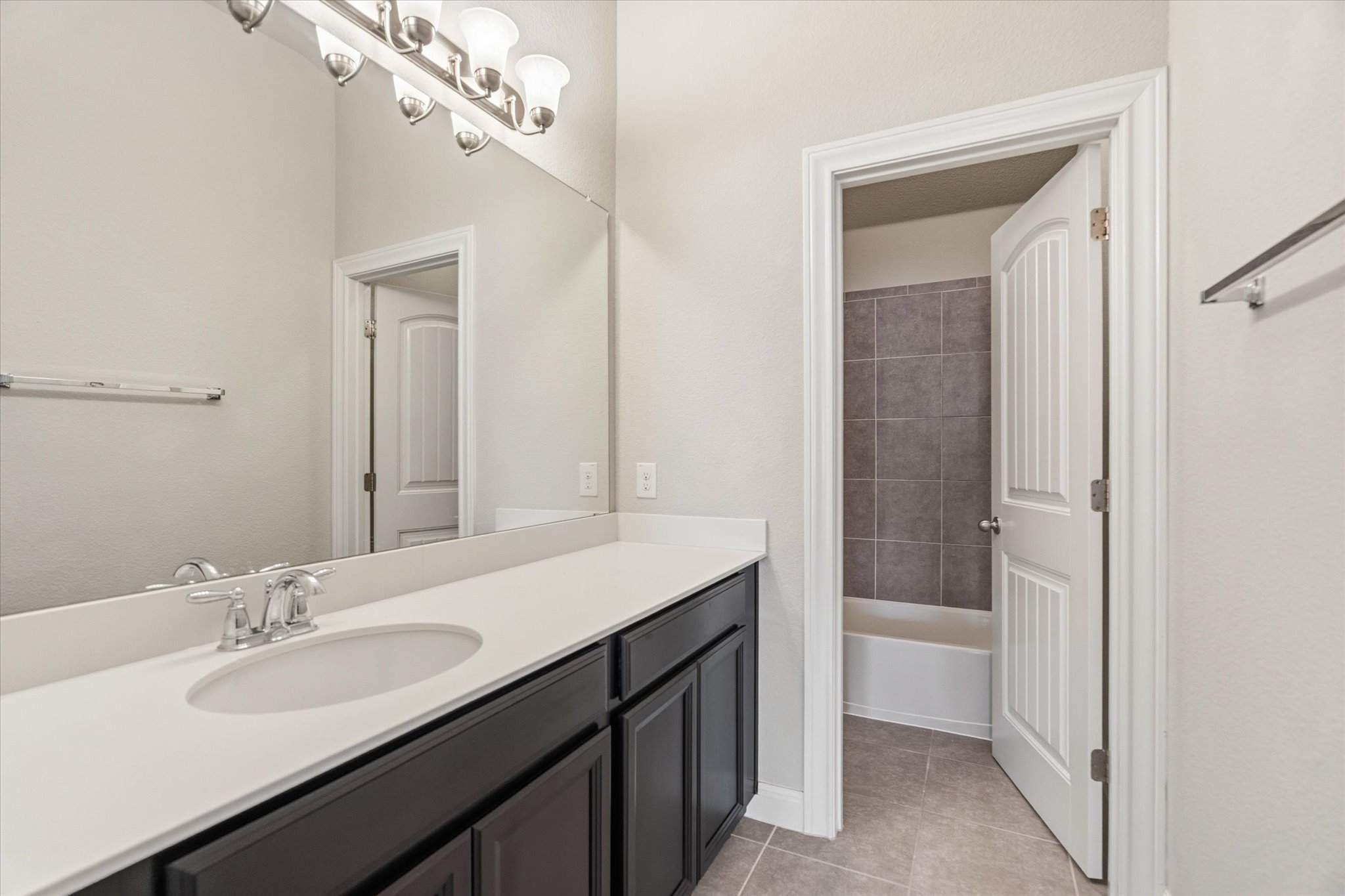 2300 Centennial Loop Round Rock, TX 78665 - Photo 30 of 40 These well-appointed bathrooms provide comfort and convenience for family and guests.