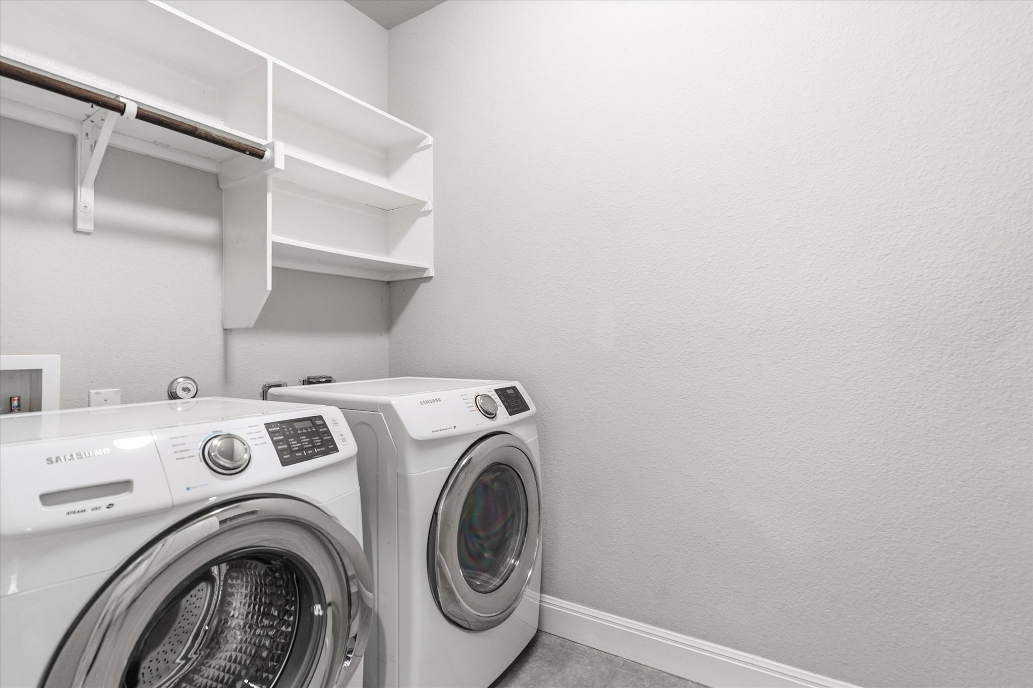 2300 Centennial Loop Round Rock, TX 78665 - Photo 31 of 40 The dedicated laundry room offers a functional space for everyday household tasks.