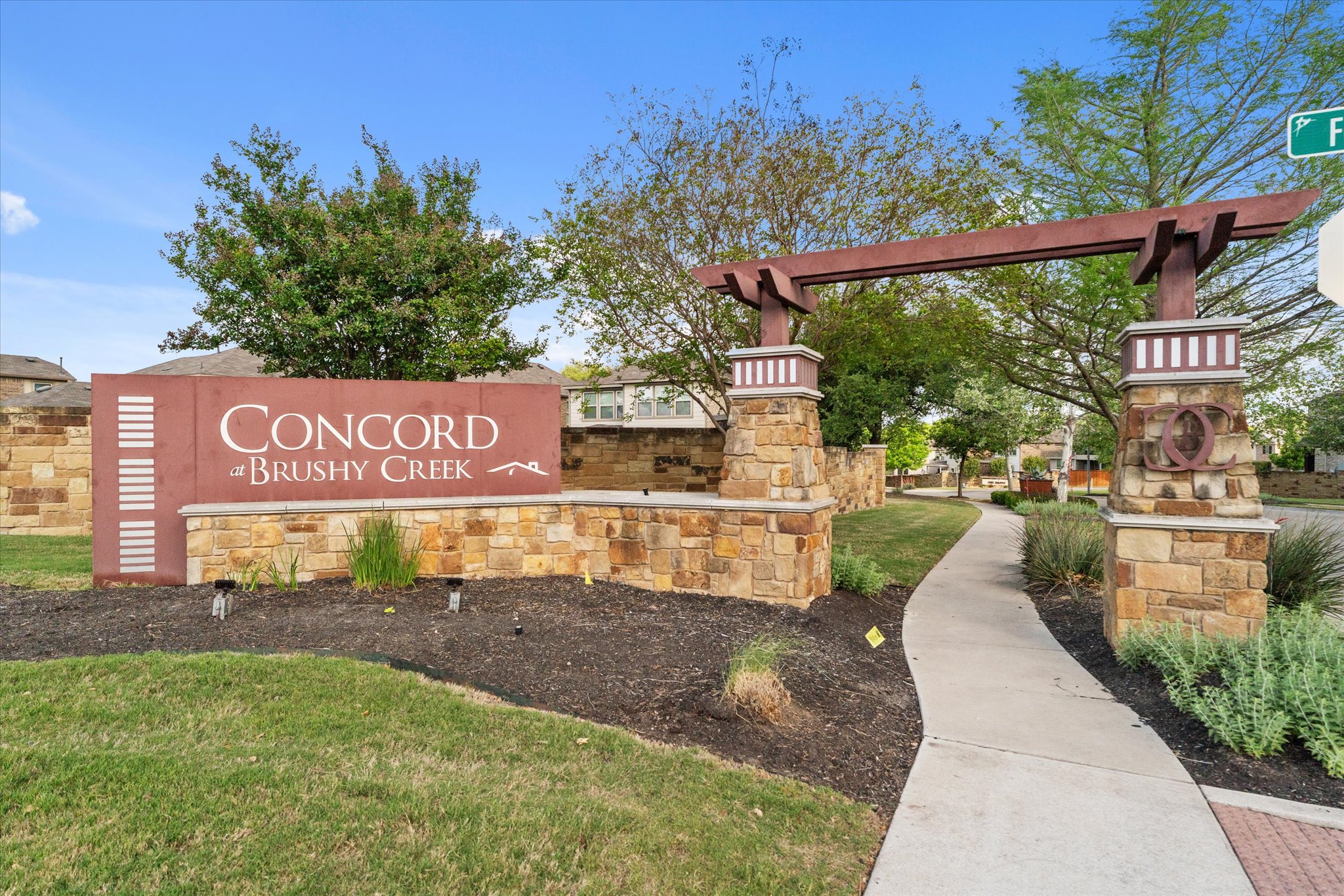 2300 Centennial Loop Round Rock, TX 78665 - Photo 37 of 40 The welcoming neighborhood entrance sets the tone for this desirable community.