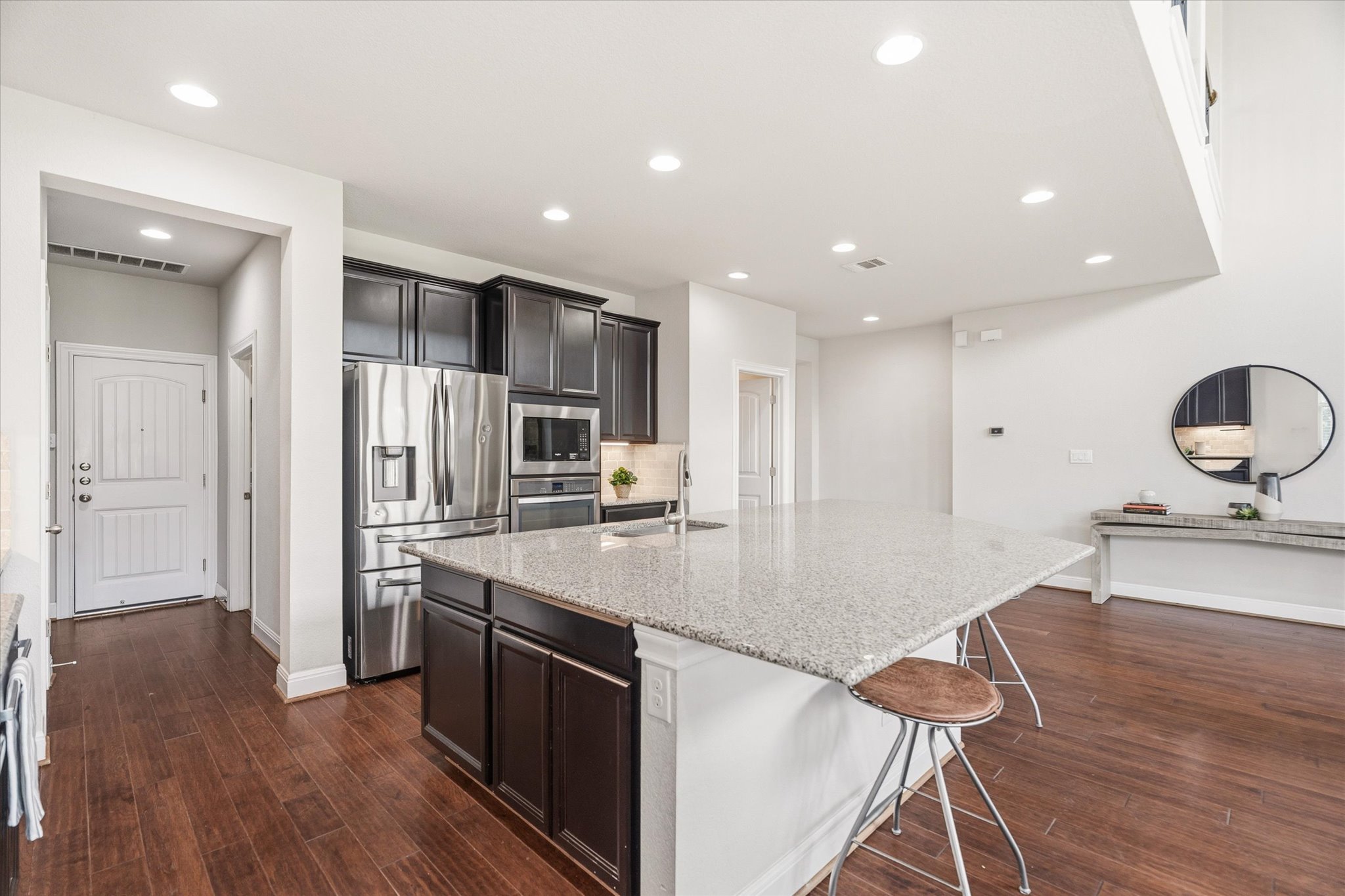 2300 Centennial Loop Round Rock, TX 78665 - Photo 10 of 40 A large center island offers additional prep space and seating for casual gatherings.