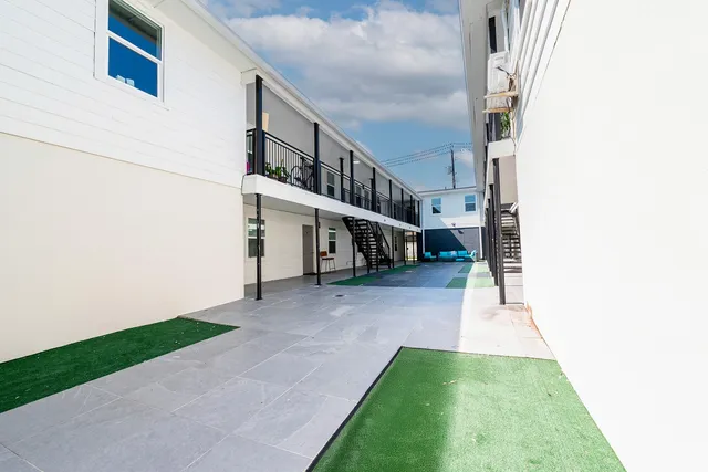 a view of a back yard of the house