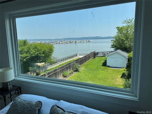 a bathroom with a bathtub and window