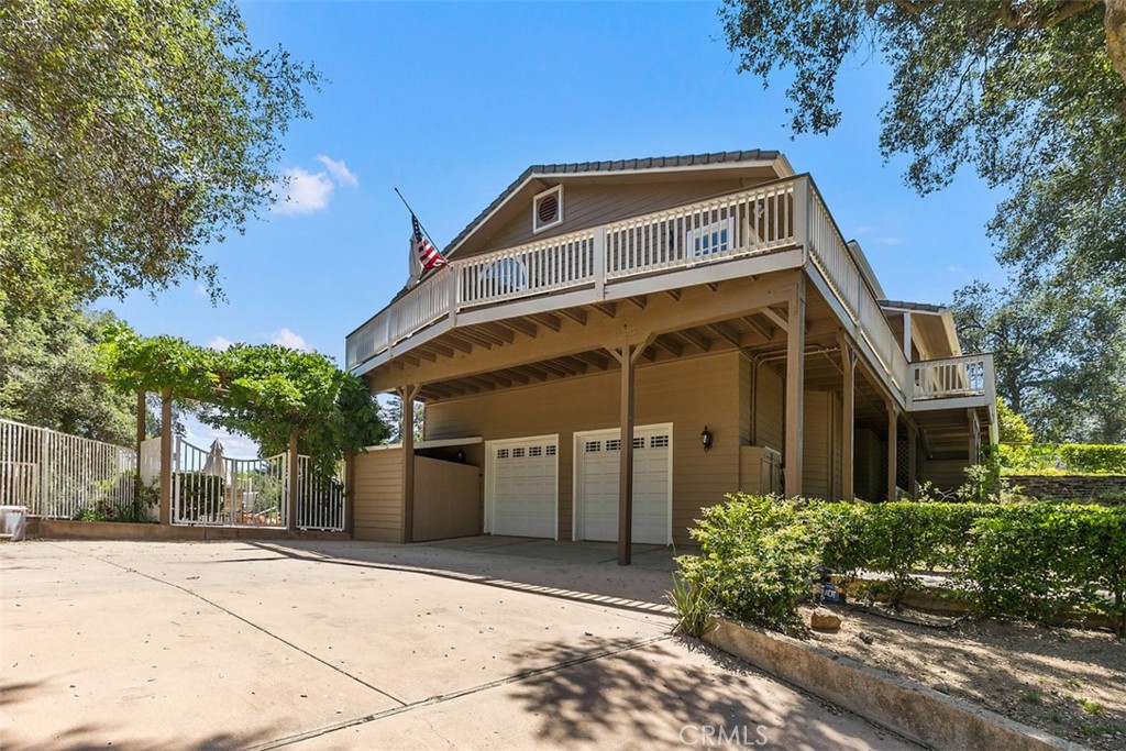 35455 El Niguel Road Lake Elsinore, CA 92530 - Photo 14 of 58 a front view of a house with a yard