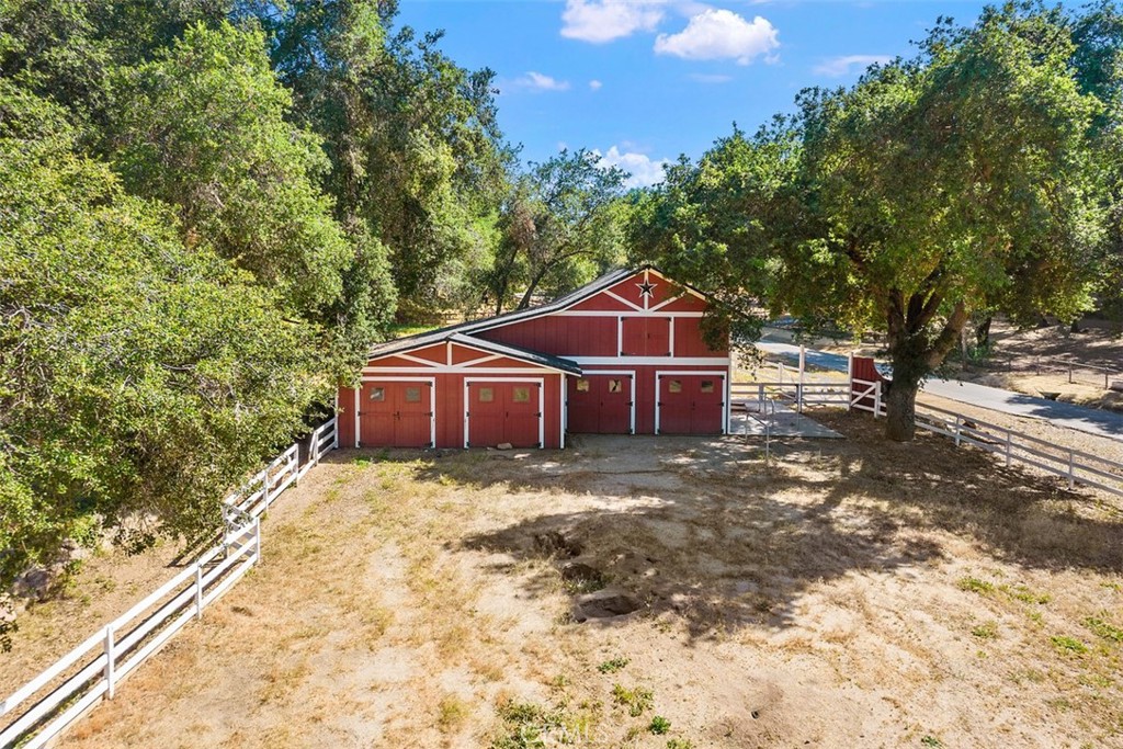 35455 El Niguel Road Lake Elsinore, CA 92530 - Photo 2 of 58 a view of a house with a yard