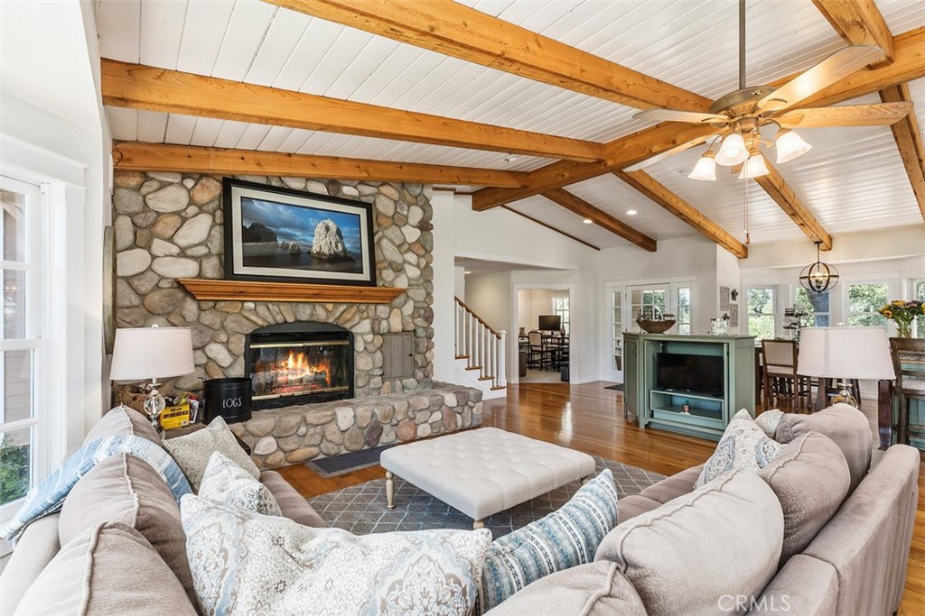 35455 El Niguel Road Lake Elsinore, CA 92530 - Photo 22 of 58 a living room with furniture and a fireplace