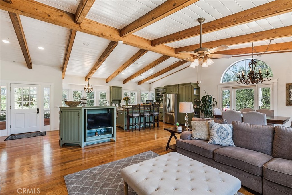 35455 El Niguel Road Lake Elsinore, CA 92530 - Photo 24 of 58 a living room with furniture and a chandelier