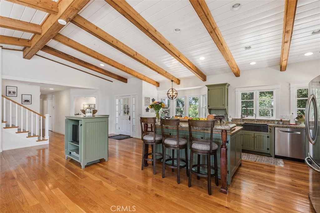 35455 El Niguel Road Lake Elsinore, CA 92530 - Photo 26 of 58 a view of a dining room with furniture window and wooden floor