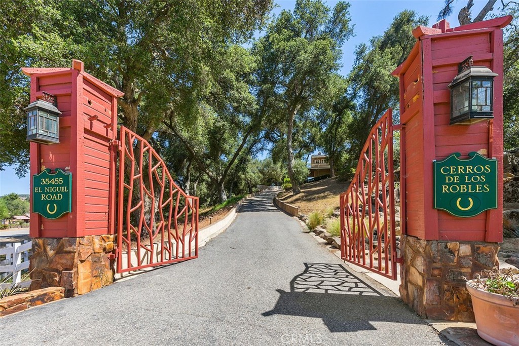 35455 El Niguel Road Lake Elsinore, CA 92530 - Photo 3 of 58 a street view with tall buildings and a street view