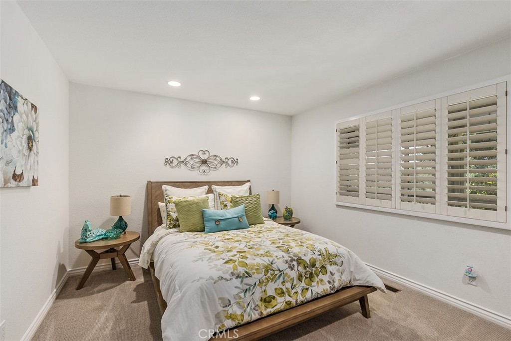 35455 El Niguel Road Lake Elsinore, CA 92530 - Photo 31 of 58 a bedroom with a bed and a window