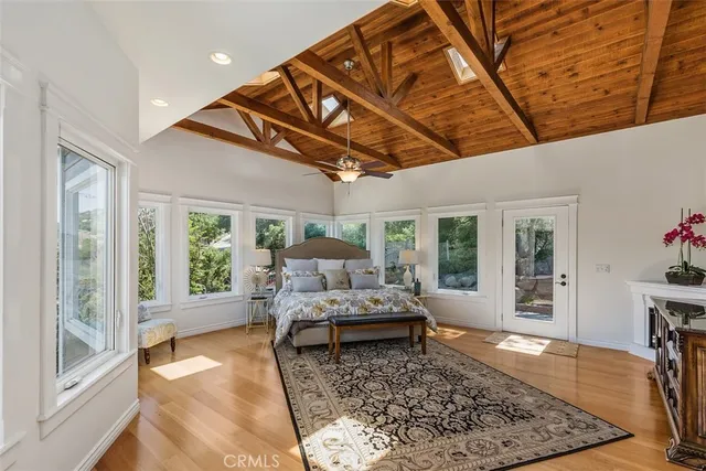 a living room with furniture and flowers