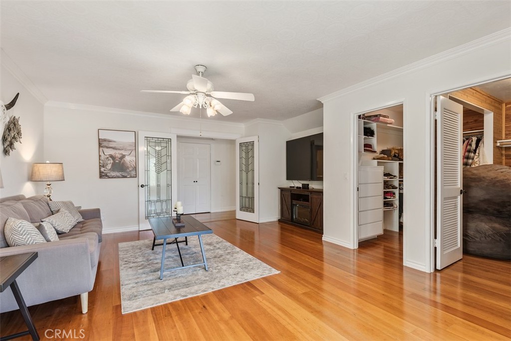 35455 El Niguel Road Lake Elsinore, CA 92530 - Photo 36 of 58 a living room with furniture a dining table and a refrigerator