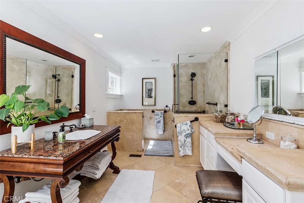 35455 El Niguel Road Lake Elsinore, CA 92530 - Photo 37 of 58 a spacious bathroom with a double vanity sink and a mirror