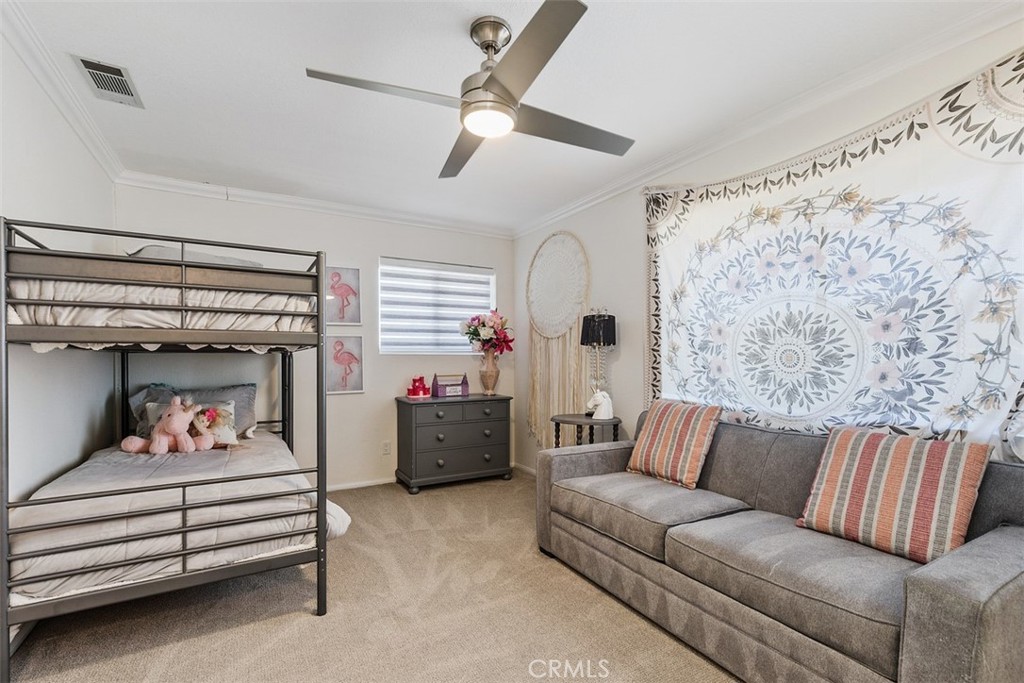 35455 El Niguel Road Lake Elsinore, CA 92530 - Photo 39 of 58 a living room with furniture and a chandelier