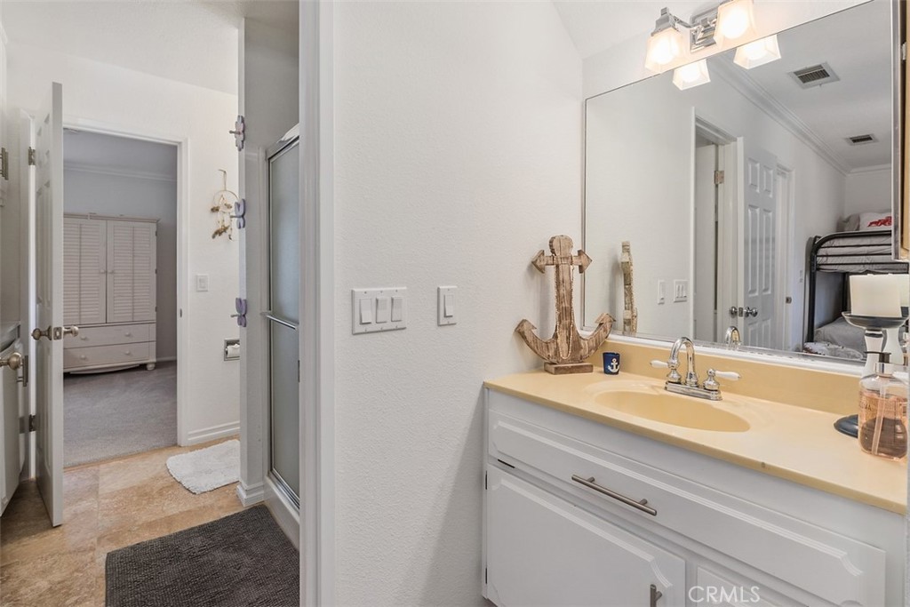 35455 El Niguel Road Lake Elsinore, CA 92530 - Photo 42 of 58 a bathroom with a sink double vanity and a mirror